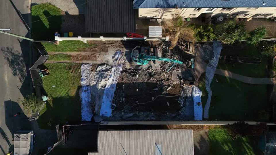 Aerial view of construction site with digger.